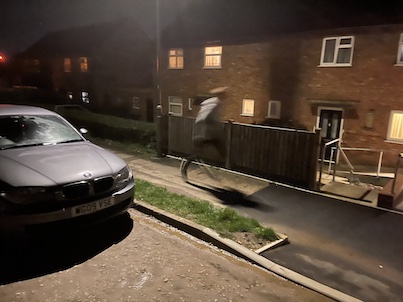 Lamp Posts at night with runner