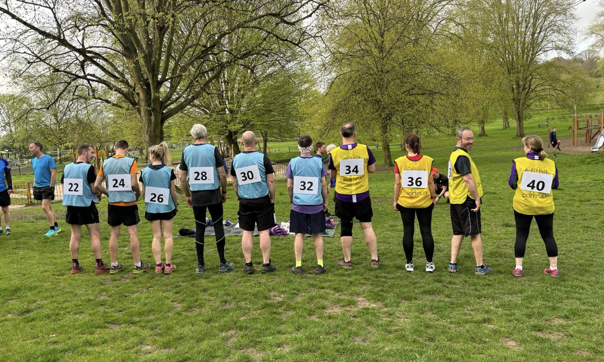 Runners wearing their pacemaker bibs